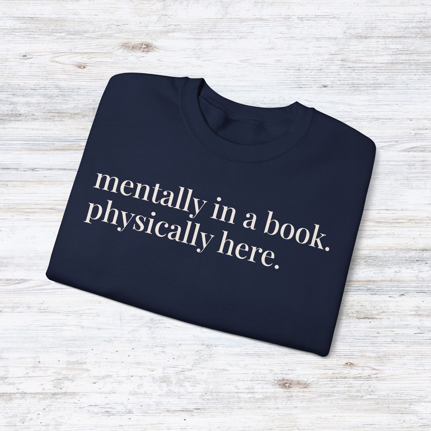 mentally in a book. physically here. | reader core crewneck