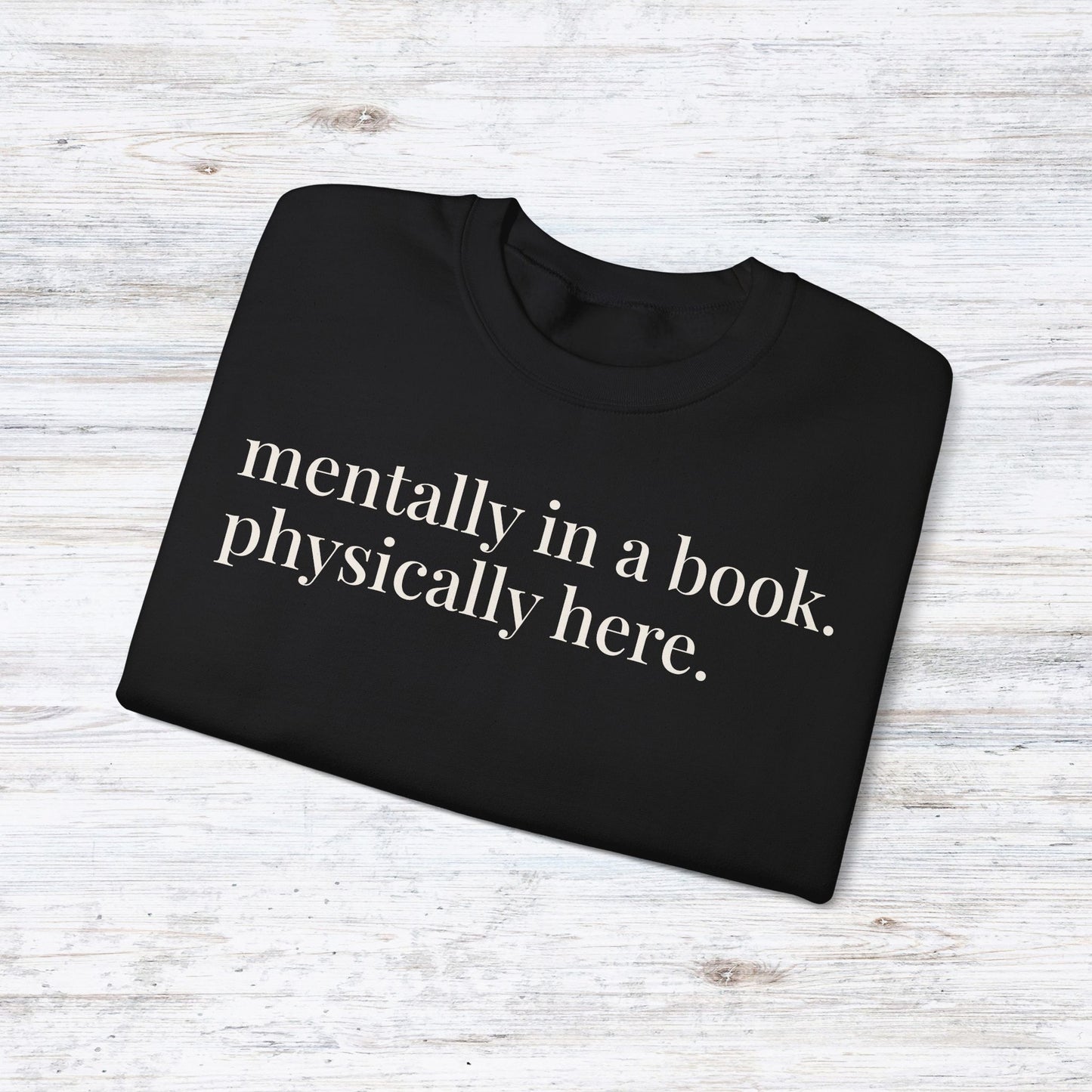 mentally in a book. physically here. | reader core crewneck