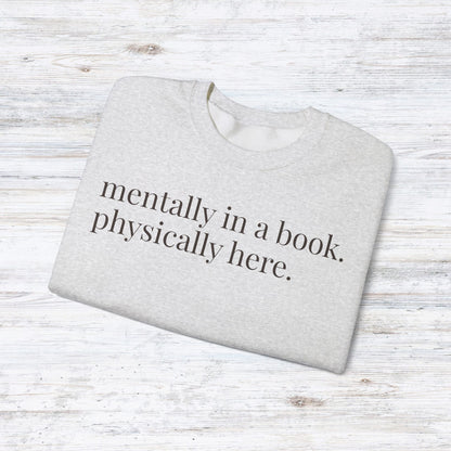 mentally in a book. physically here. | reader core crewneck