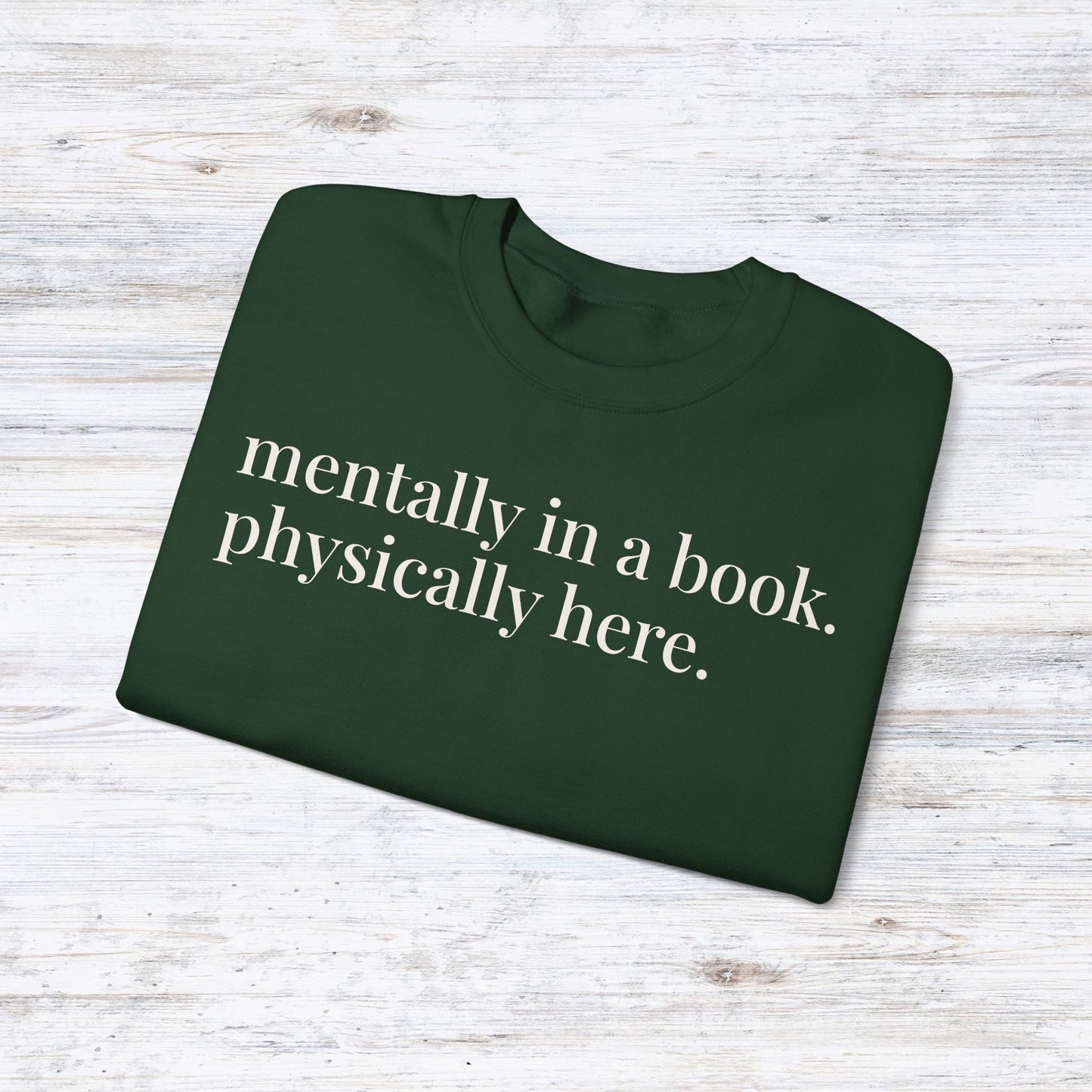 mentally in a book. physically here. | reader core crewneck